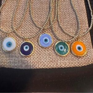 Imported from Italy, murano glass evil eye pendant with gold vermeil 16 “ chain